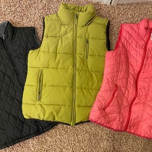 Women’s lot of 3 winter vests. Black is reversible to gray plush.